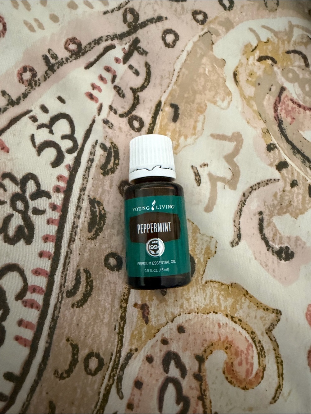 Young Living Peppermint Essential Oil - Teal and White Bottle